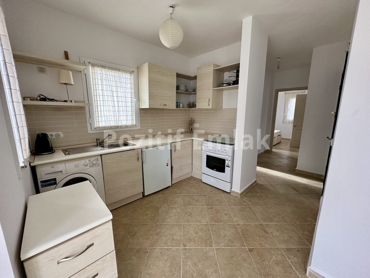 Gümüşlük'te Havuzlu Güvenlikli Sitede Manzaralı Ferah Daire